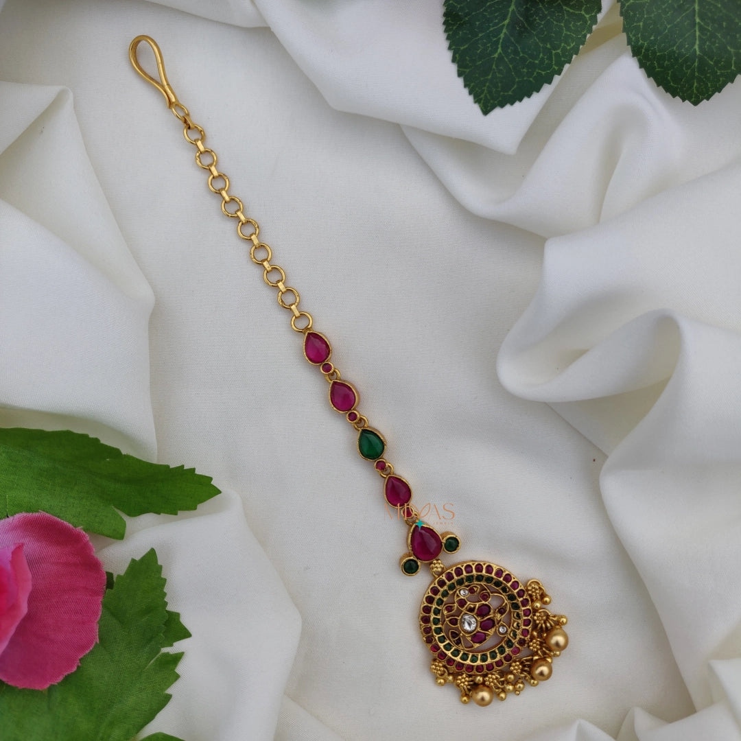 Pretty Peacock Motifs Tikka with Gold Beads