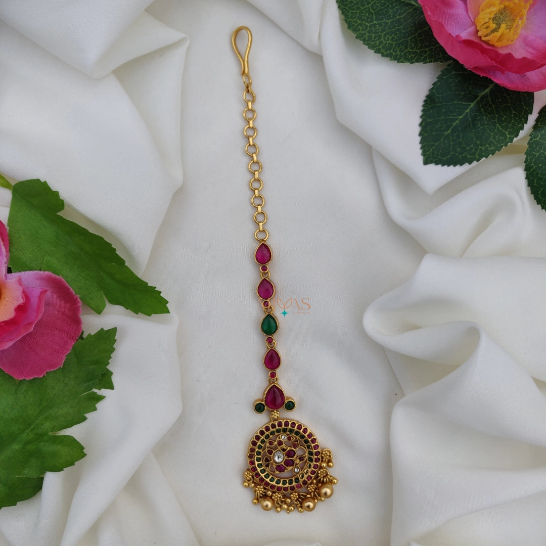 Pretty Peacock Motifs Tikka with Gold Beads